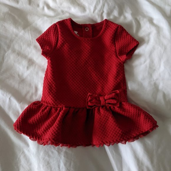 Red peplum top with bow - Picture 1 of 4